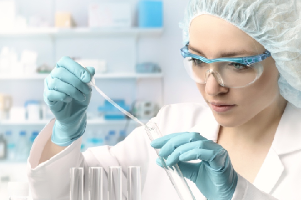 Worker in laboratory doing tests